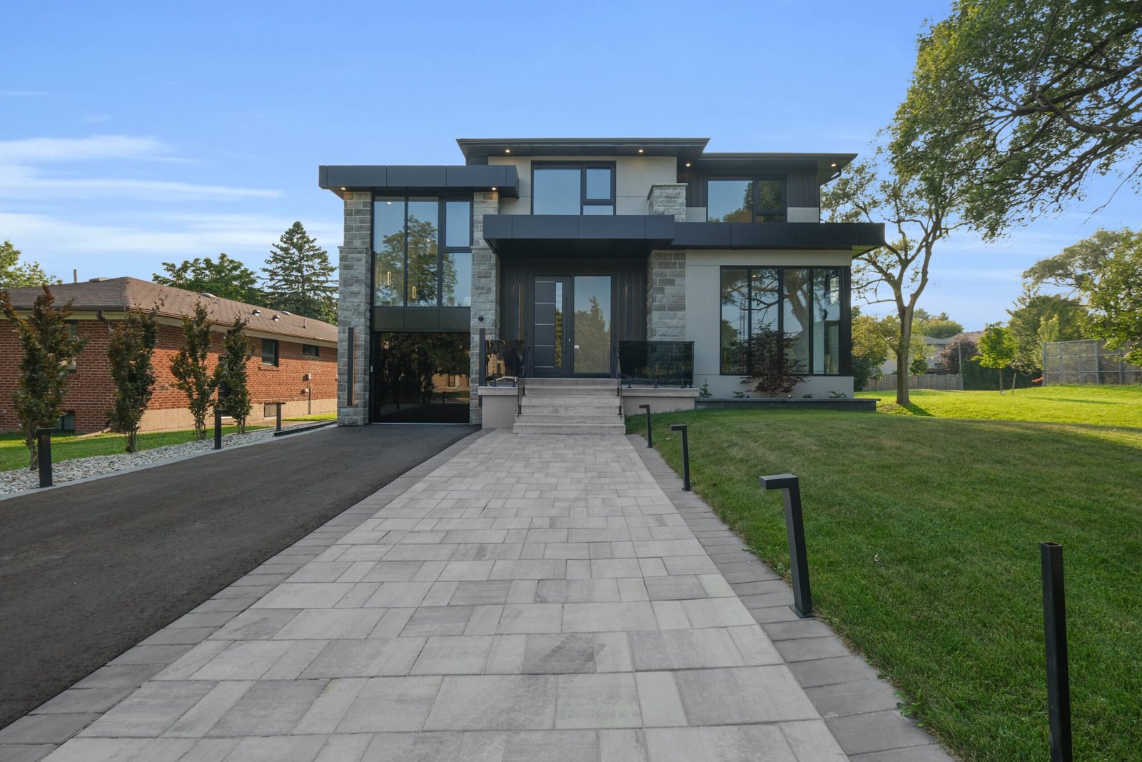 Custom home design services featuring an elegant home addition exterior.