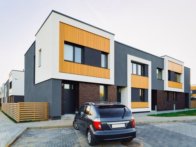 Modern townhouse row showcasing contemporary residential architecture design