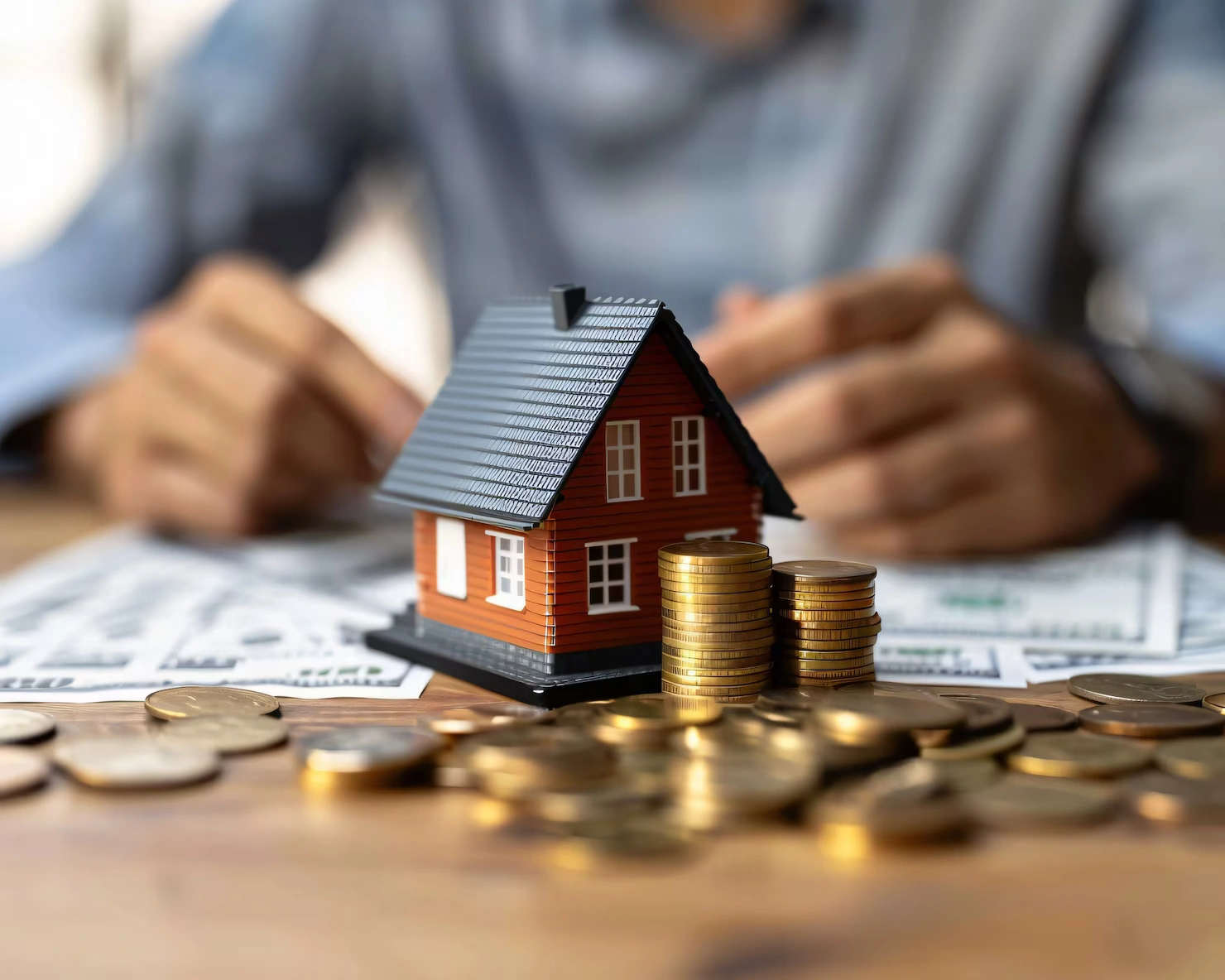 Homeowner reviewing budget documents and cost estimates for a home addition project in Toronto